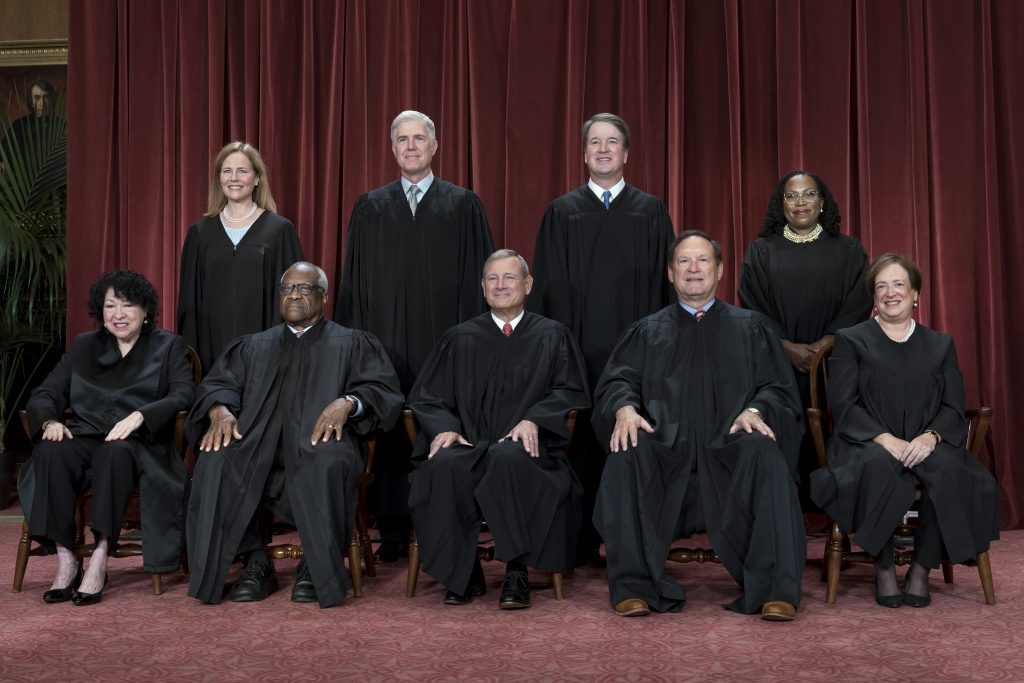 Associate Justice Amy Coney Barrett (top left) joined members of the Supreme Court for a new group portrait following the addition of Associate Justice Ketanji Brown Jackson, at the Supreme Court building in Washington, D.C., Friday, Oct. 7, 2022. Bottom row, from left, Associate Justice Sonia Sotomayor, Associate Justice Clarence Thomas, Chief Justice of the United States John Roberts, Associate Justice Samuel Alito, and Associate Justice Elena Kagan. Top row, from left, Associate Justice Amy Coney Barrett, Associate Justice Neil Gorsuch, Associate Justice Brett Kavanaugh, and Associate Justice Ketanji Brown Jackson. 