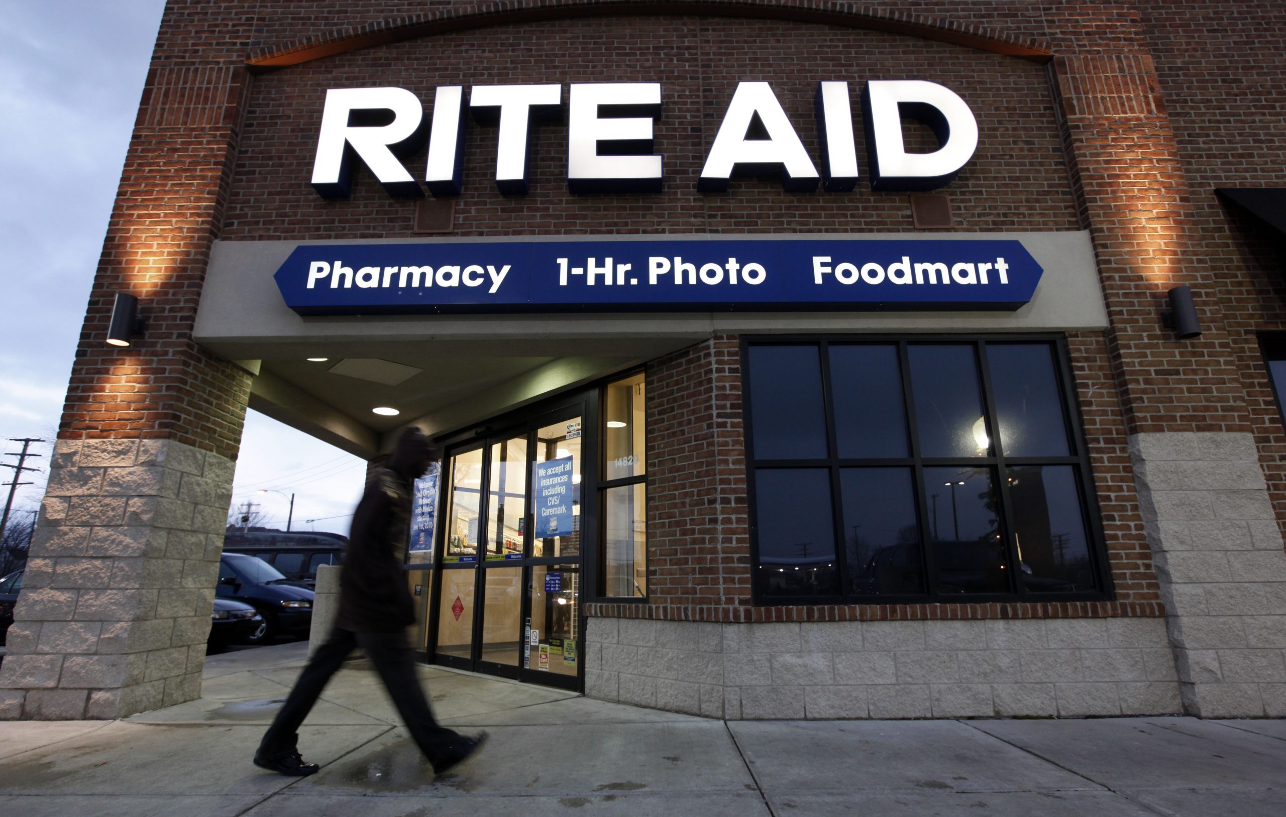 FILE - In this Dec. 15, 2009 file photo, a customer enters a Rite Aid store in Detroit. Rite Aid reports quarterly financial results on Thursday, June 19, 2014. (AP Photo/Paul Sancya, File)