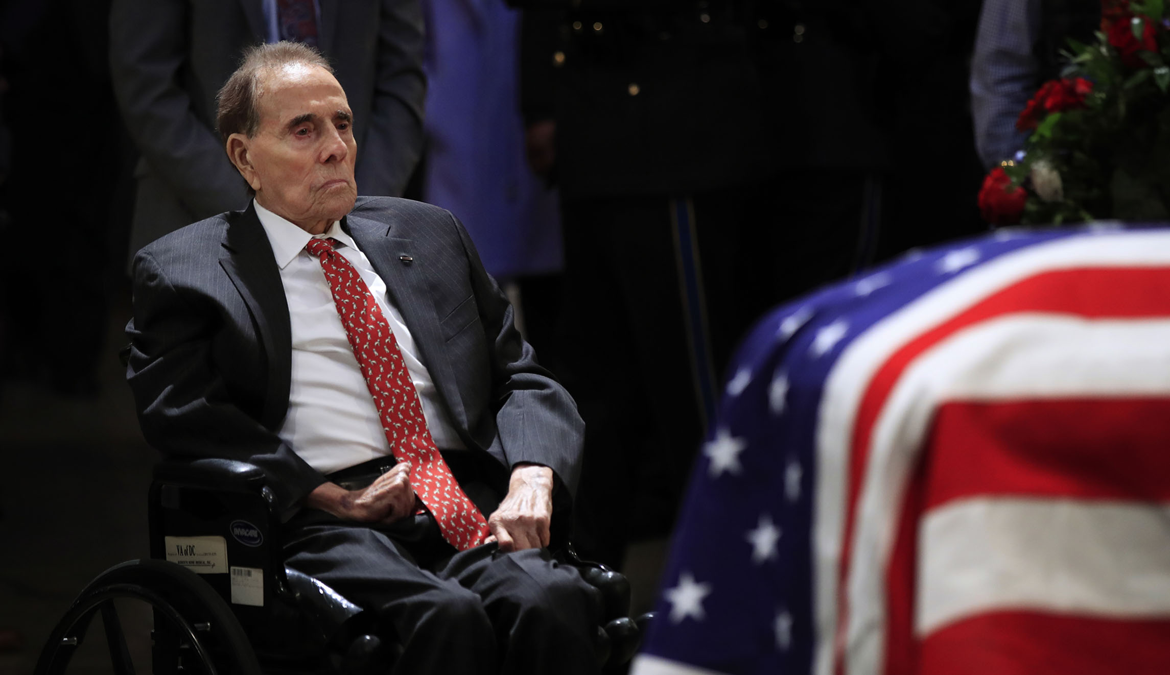 The touching backstory to Bob Dole’s salute to George H.W. Bush ...