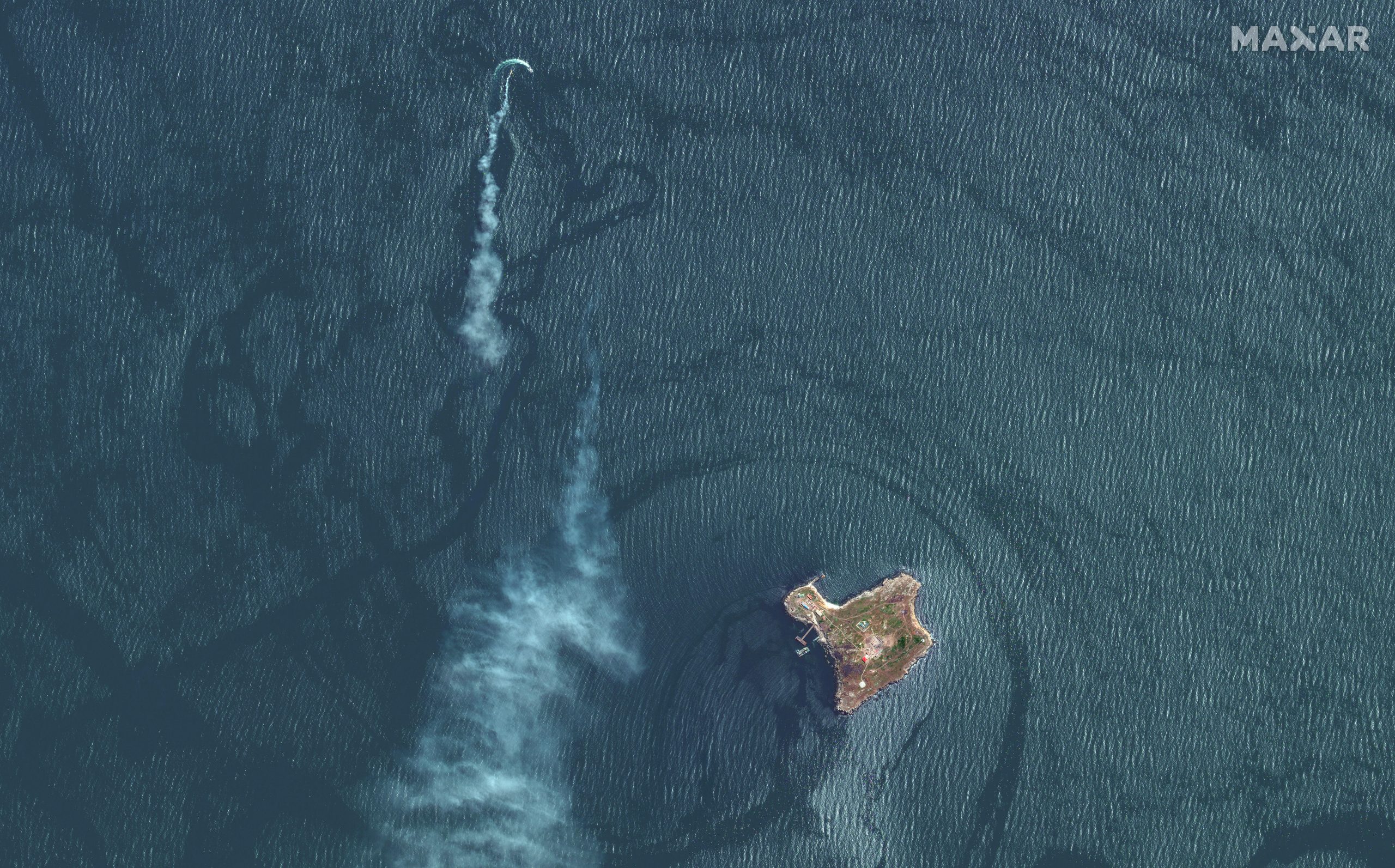 Shown from above are Snake Island and an attack on Russian landing craft.