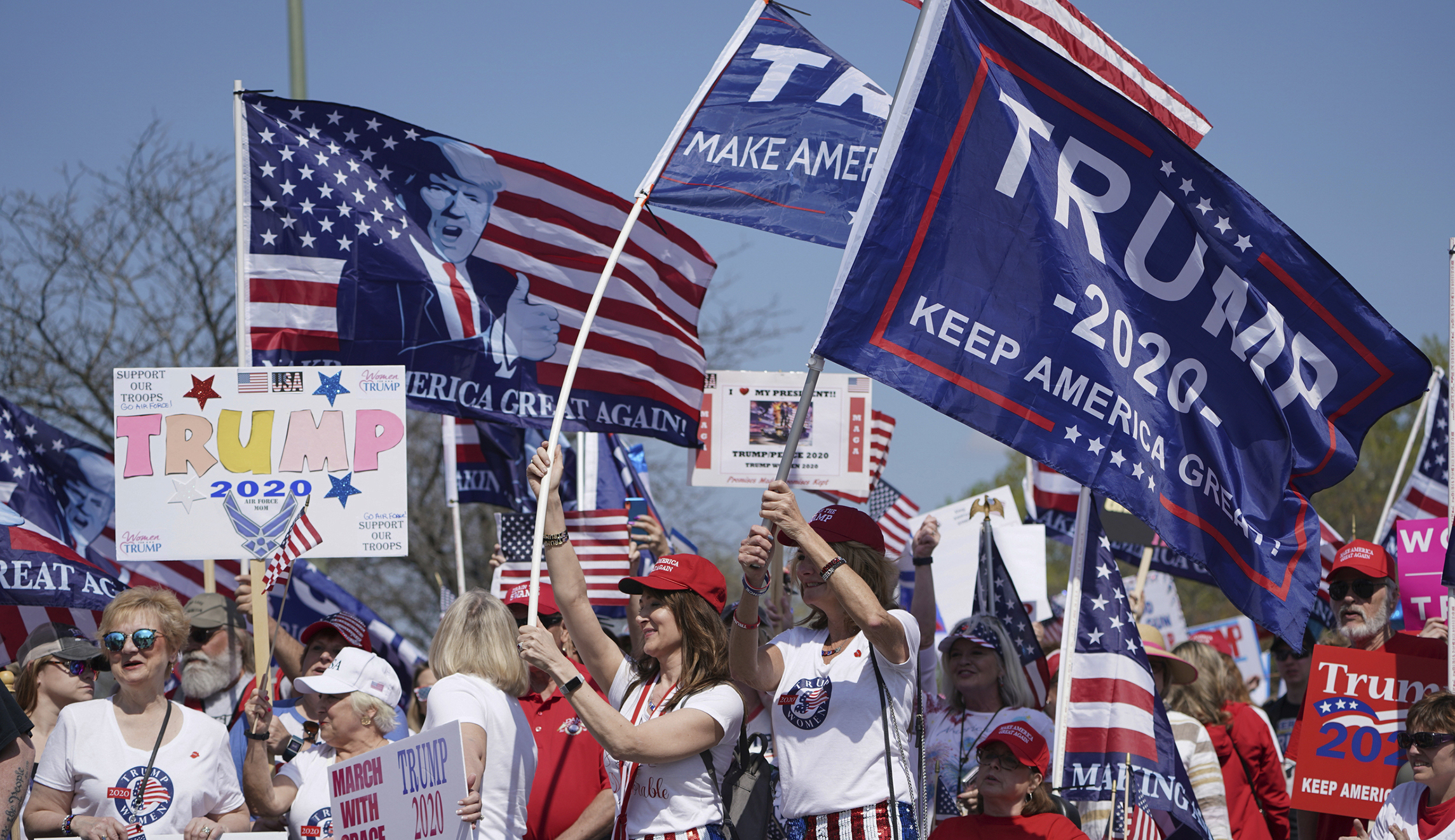 Trump supporters march down Washington streets to back president after his coronavirus diagnosis - Washington Examiner