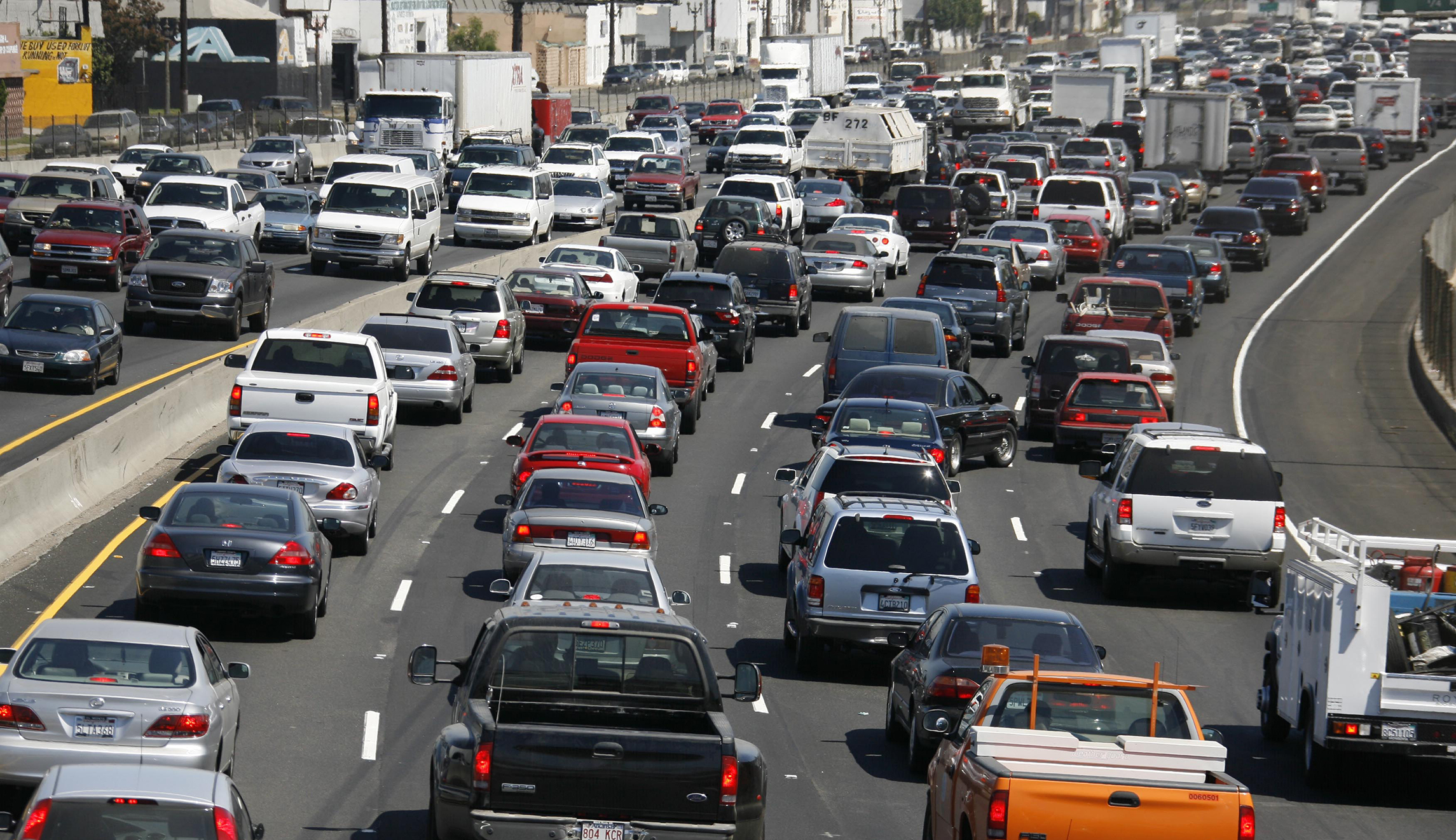 Southbound traffic on Interstate 5 moves through Los Angeles, Sept. 1, 2006. Oral arguments were scheduled Friday Sept. 15, 2006, in a U.S. District Court regarding California's requirement that automakers reduce emissions. At issue is whether California has the right under the federal Clean Air Act to regulate greenhouse gas emissions through tailpipe standards.