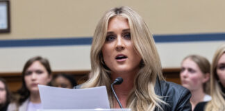 Former collegiate swimmer Riley Gaines testifies during a House Oversight Subcommittee on Health Care and Financial Services hearing on Capitol Hill December 5, 2023 in Washington, D.C. The hearing focused on the Biden administration's proposed rule changes to Title IX to redefine the definition of sexual discrimination to include gender identity.