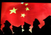 Navy sailor gets 27-month prison sentence after sharing sensitive military information with China Security guard walk past the Chinese national flag at the Military Museum of Chinese People's Revolution on March 1, 2008 in Beijing, China. (Photo by China Photos/Getty images)