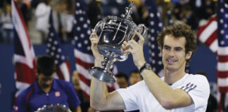 Mike Groll/AP
Britain's Andy Murray won last year's U.S. Open. Starting in 2015, ESPN will broadcast the tournament on TV as well as mobile devices.