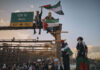 Protesters shout slogans as they cross Brooklyn Bridge during a Pro-Palestine demonstration demanding the ceasefire on Saturday, Oct. 28, 2023, in New York.