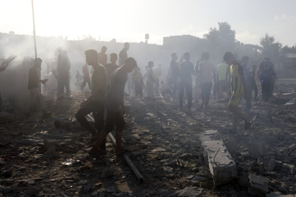 Palestinians inspect the damage of a destroyed mosque following an Israeli airstrike in Khan Younis refugee camp, southern Gaza Strip on Nov. 8, 2023. Entire generations of Palestinian families in the besieged Gaza Strip have been killed in airstrikes in the Hamas-Israel war. They include infants to elderly grandparents, killed in attacks the Israeli army says aim to root out the militant group from the densely populated coastal territory.