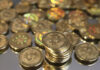 Hacked SEC account announces misleading bitcoin news: Chairman Gary Gensler A pile of Bitcoins are shown here after Software engineer Mike Caldwell minted them in his shop on April 26 in Sandy, Utah. Bitcoin is an experimental digital currency used over the Internet that is gaining in popularity worldwide. (Photo by George Frey/Getty images)