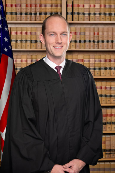 Judge-McAfee-full-length-with-robes.jpg