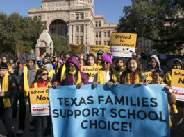 Students march at the Texas School Choice Rally at the Capitol in Austin, Texas, on Wednesday, Jan. 23, 2019. Hundreds of parents and students from around Texas gathered at the south steps of the Capitol to rally for school choice.