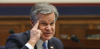 Federal Bureau of Investigation Director Christopher Wray testifies before a House Committee on Homeland Security hearing on 'worldwide threats to the homeland', Thursday, Sept. 17, 2020 on Capitol Hill Washington.
