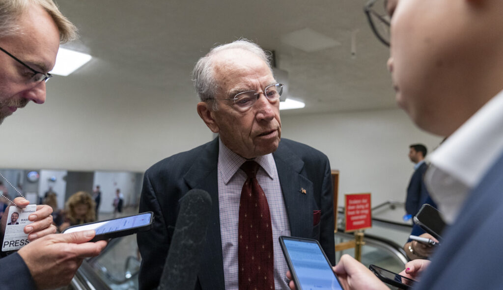 Sen. Chuck Grassley (R-IA) speaks with reporters as he heads to a vote on Capitol Hill, Wednesday, Sept. 6, 2023 in Washington. (AP Photo/Alex Brandon)