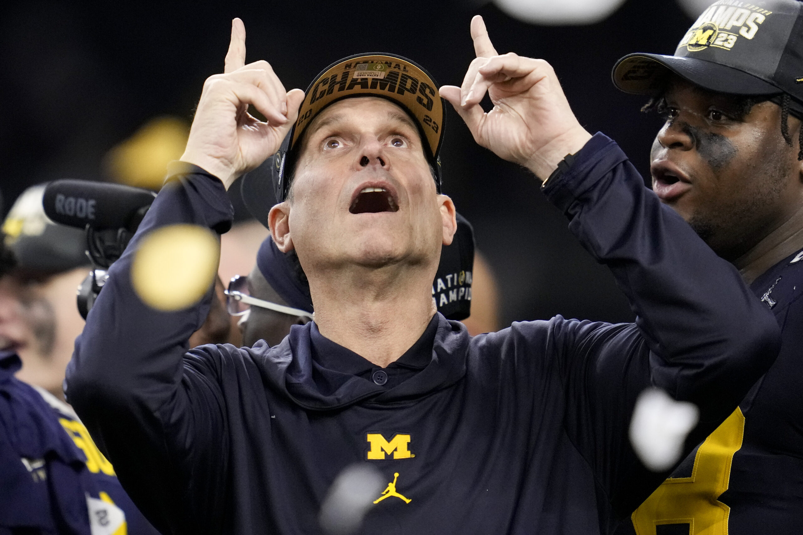 NextImg:Harbaugh returning to NFL to coach Chargers after leading Michigan to national title, AP sources say