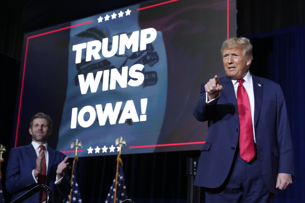 NextImg:Trump calls for unity and praises rivals after dominating Iowa caucuses