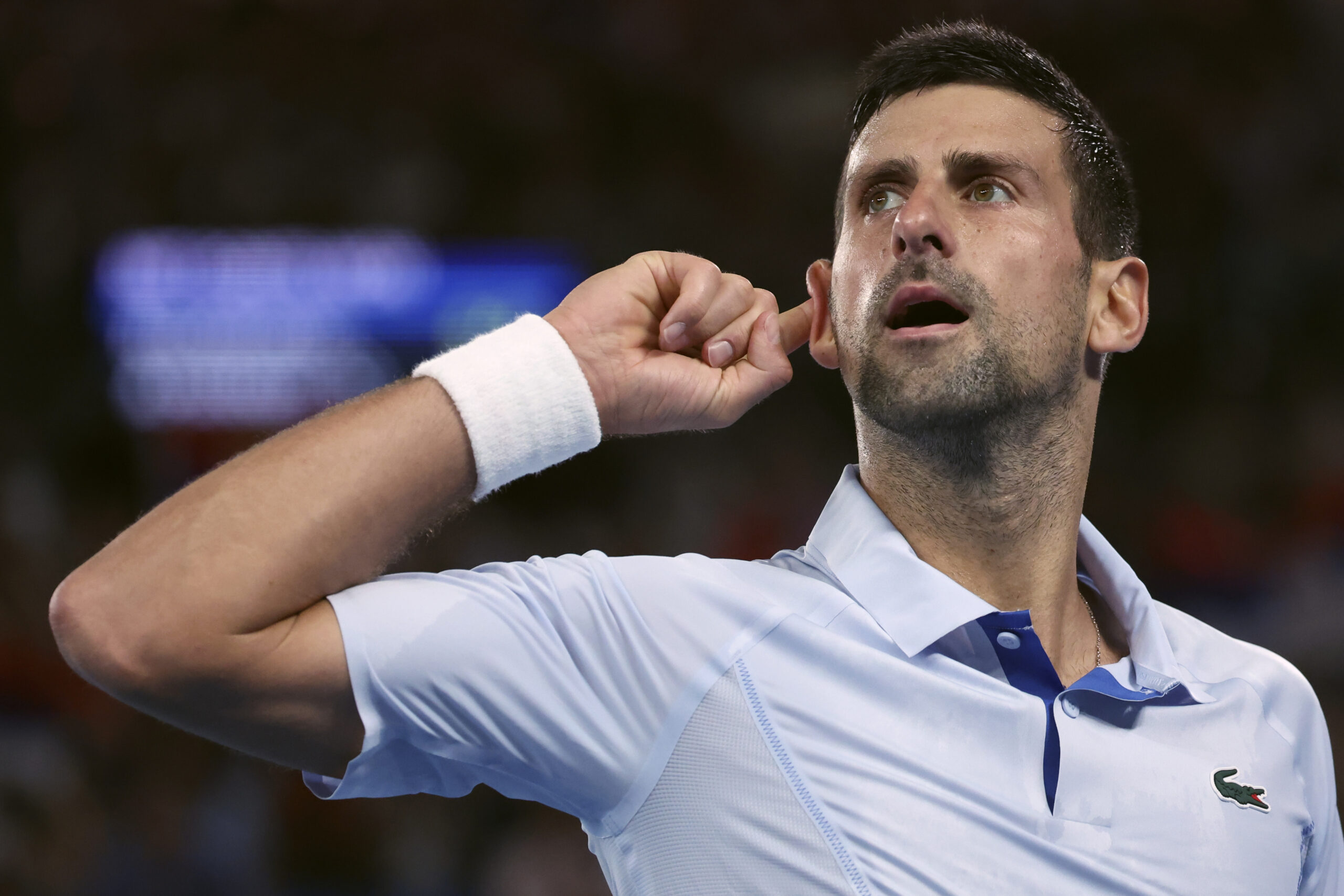 NextImg:Novak Djokovic responds to heckler by acing tennis serve