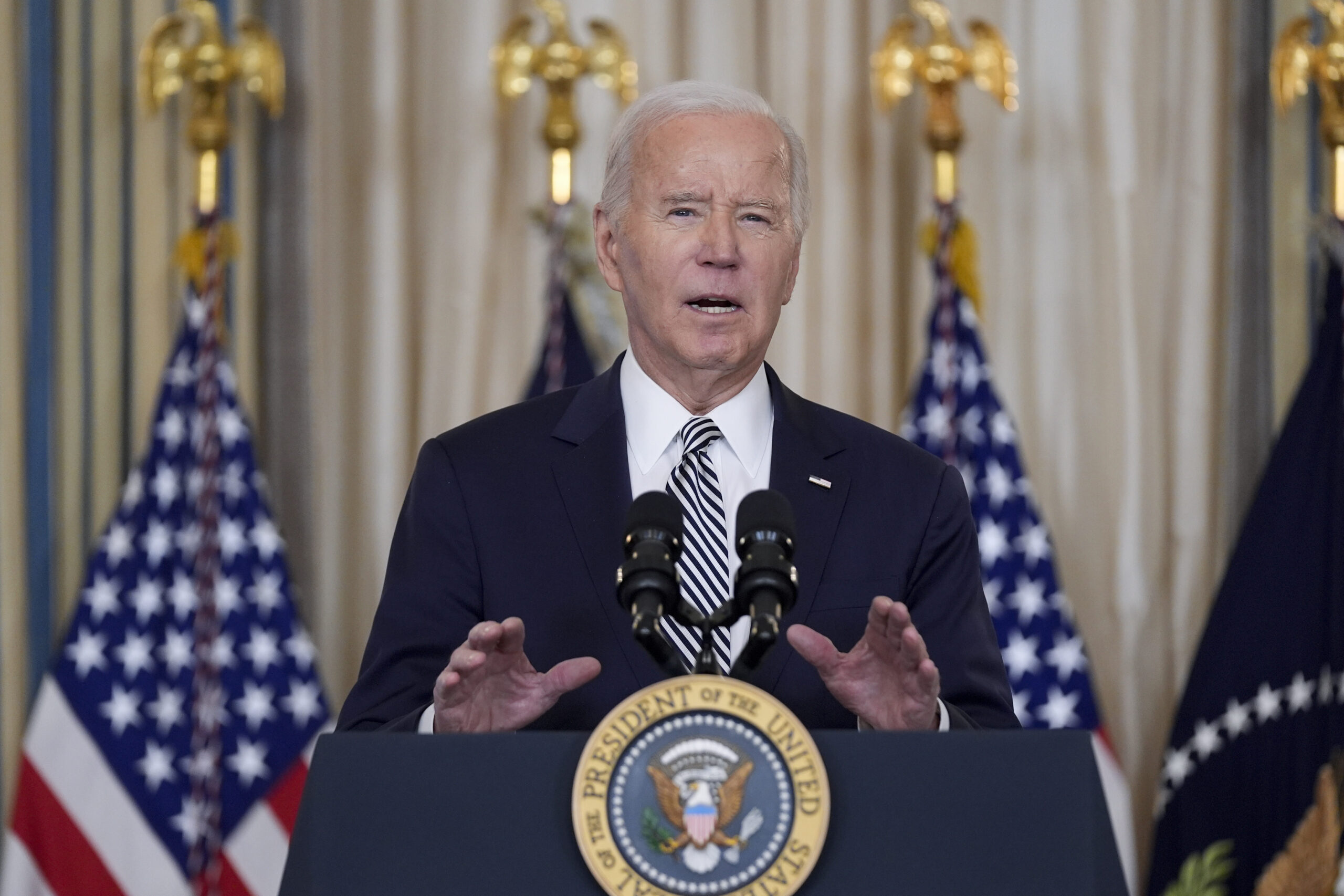 NextImg:Biden piled on by state leaders for 'government mandates' forcing EVs on consumers