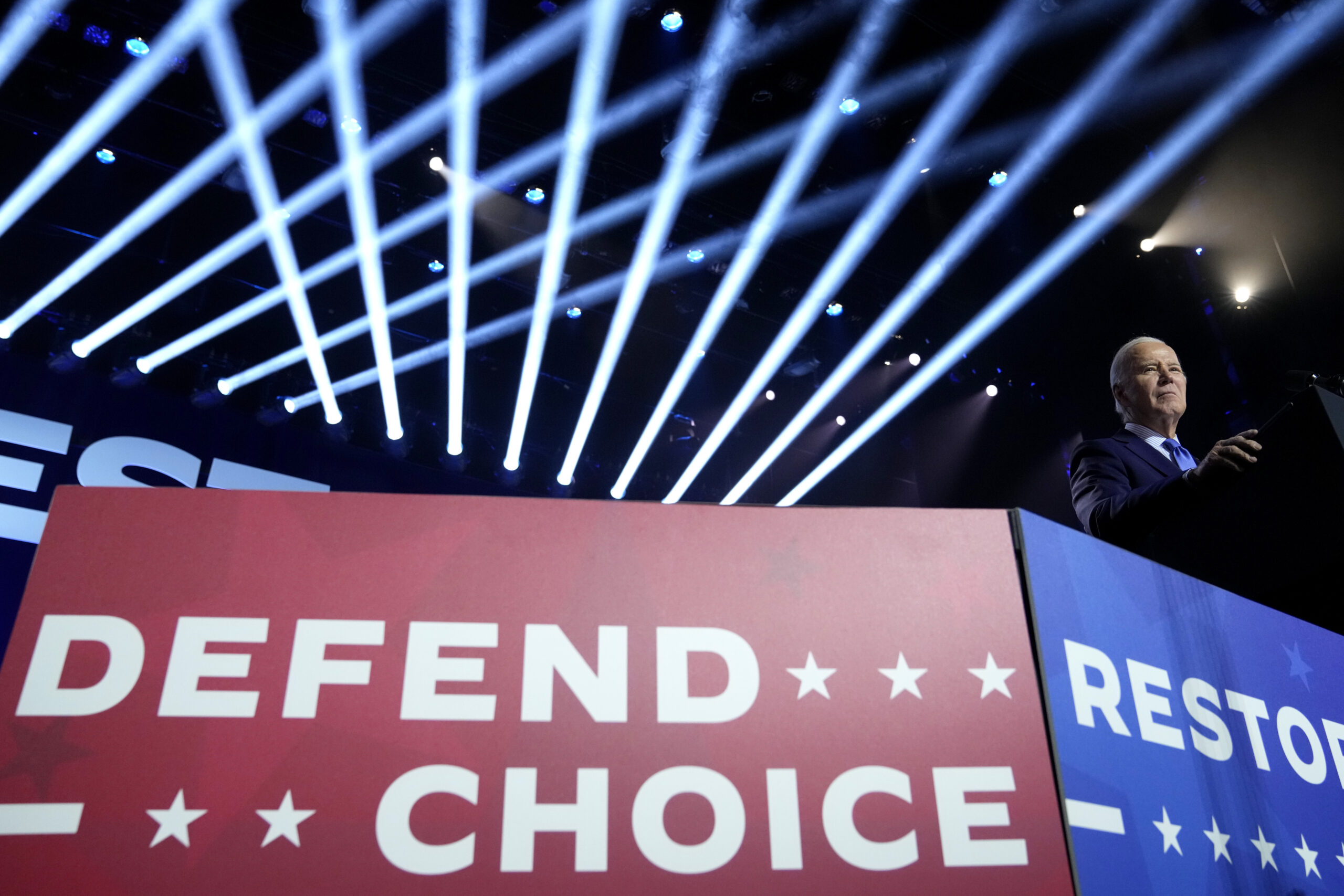 NextImg:Biden avoids embarrassment in New Hampshire primary with write-in campaign win