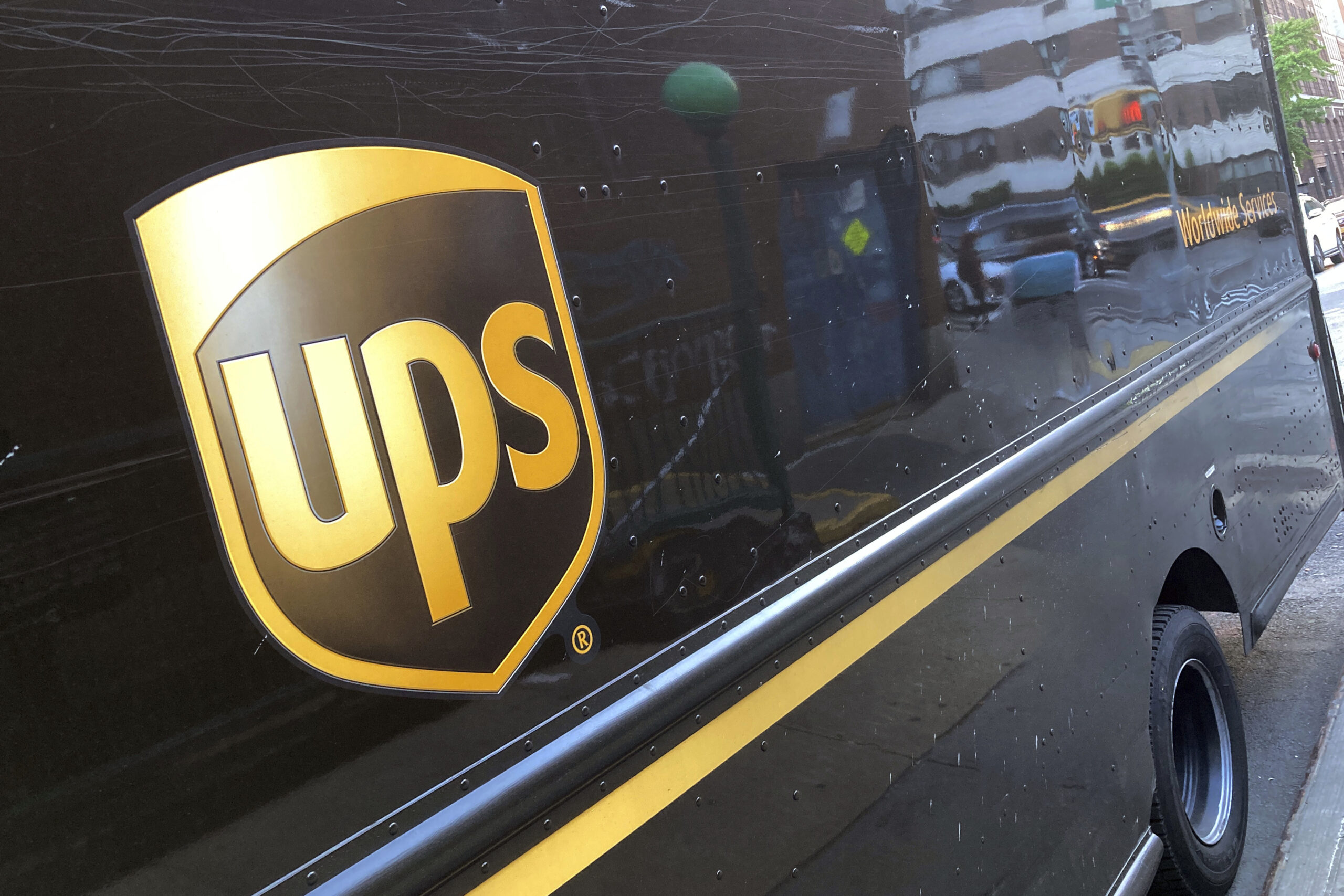UPS plans to reduce workforce by 12,000, aiming to save  billion