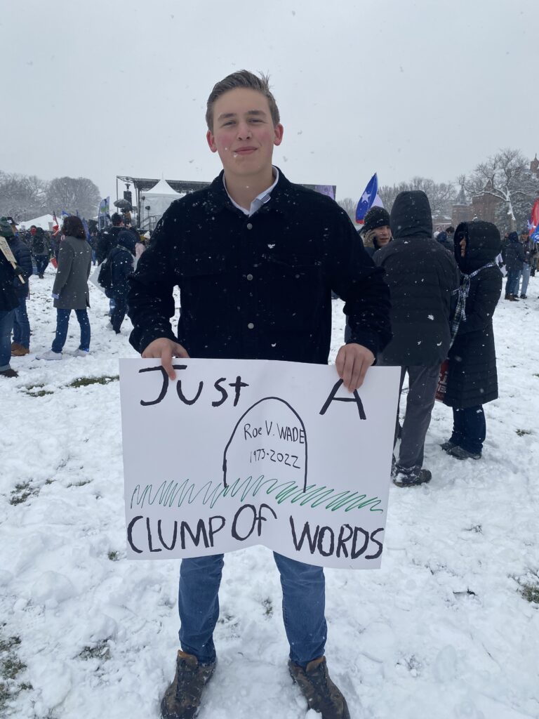 Joseph Yanta holds a sign at the 51st annual March for Life on January 19 2024. (Washington Examiner; Breccan F. Thies).