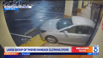 NextImg:Mob of thieves uses government vehicle to smash into and raid LA County store
