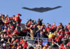 FILE - A B-2 bomber flies over spectators at Arrowhead Stadium before the AFC Championship Game between the Kansas City Chiefs and the Tennessee Titans on Jan. 19, 2020, in Kansas City, Missouri.
