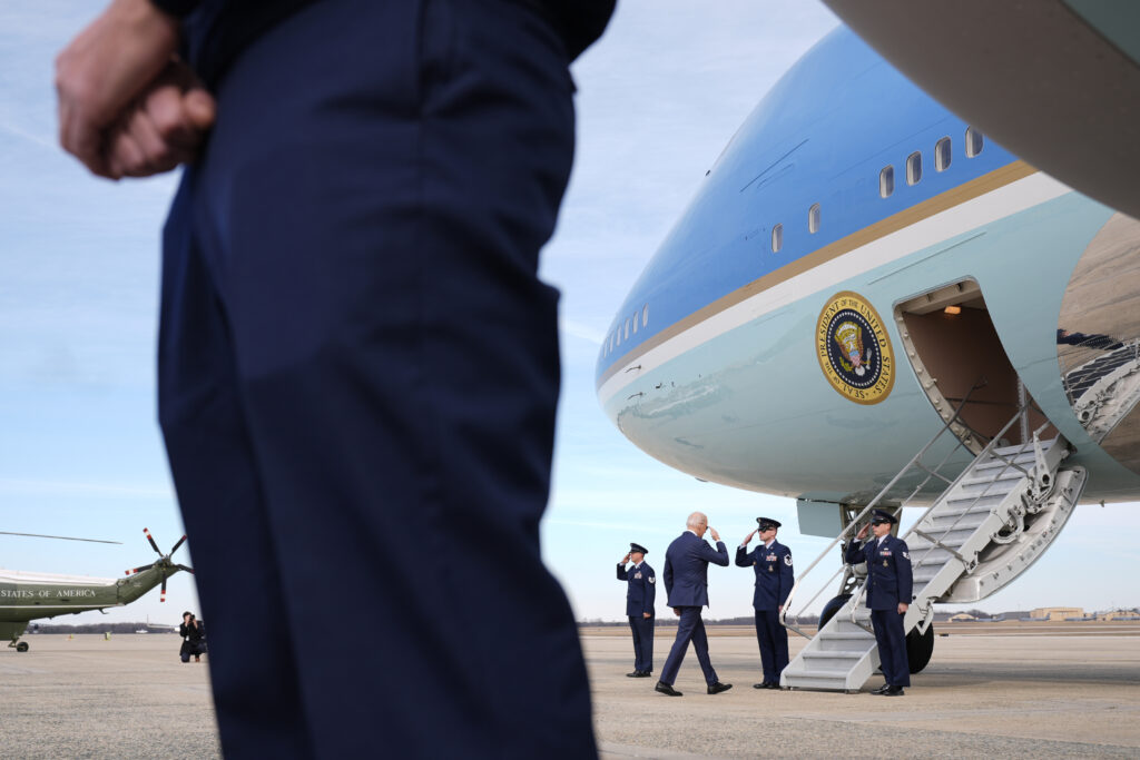 You should have kept your sneakers on, Joe! Biden, 81, ALMOST trips on the  small steps of Air Force One after the Secret Service put an agent at the  bottom to avoid
