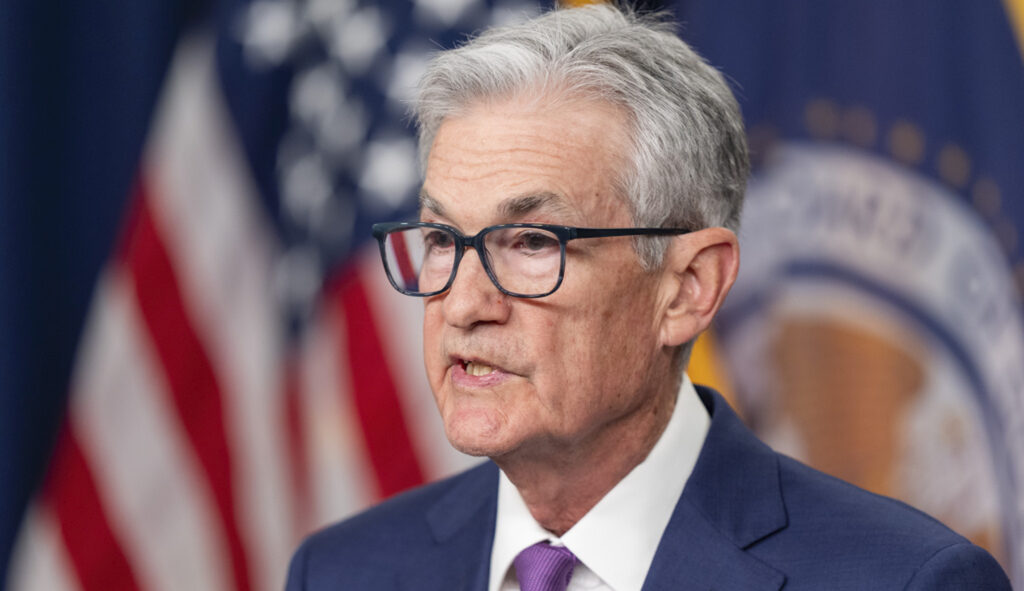 Fed holds interest rates steady as hotter inflation reports push back timing of cut