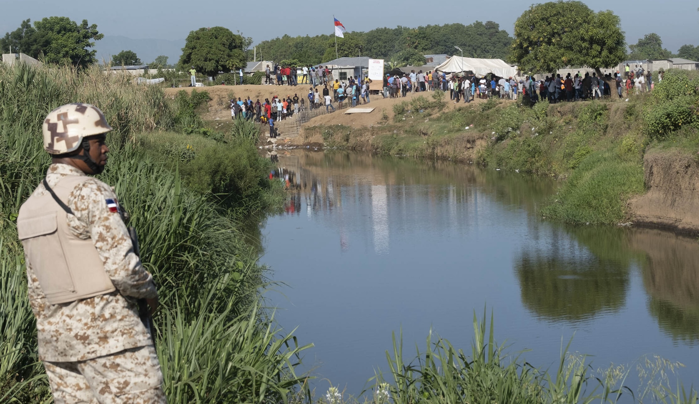 NextImg:Dominican Republic building 250-mile border barrier to wall off Haiti amid takeover by gangs - Washington Examiner