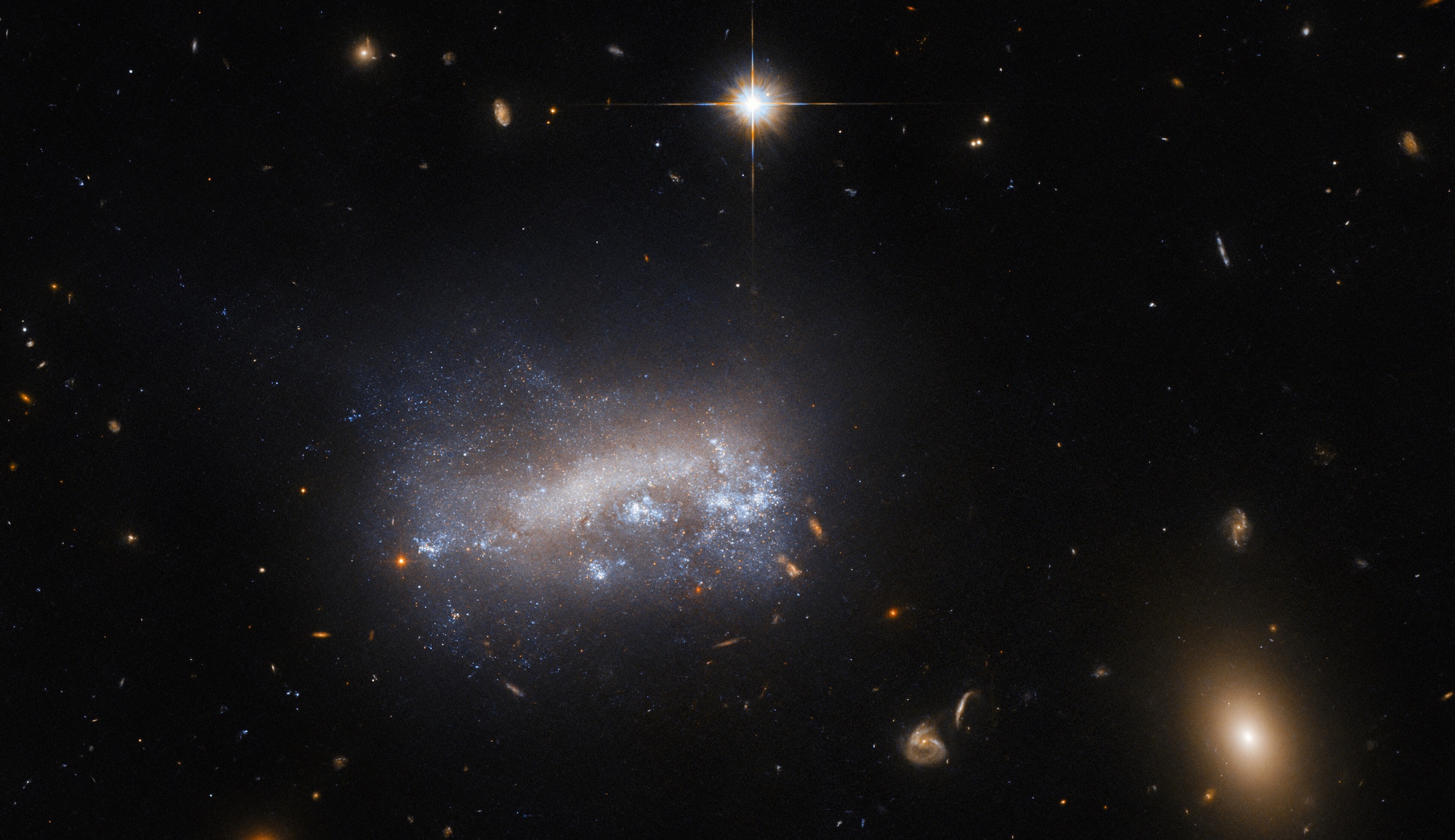 NextImg:NASA releases Hubble image of galaxy under pressure - Washington Examiner
