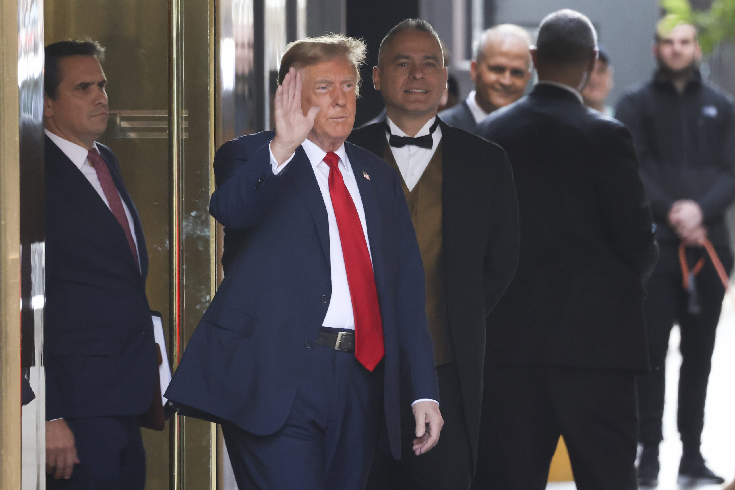 NextImg:Trump decries ‘persecution’ as he walks into historic trial - Washington Examiner