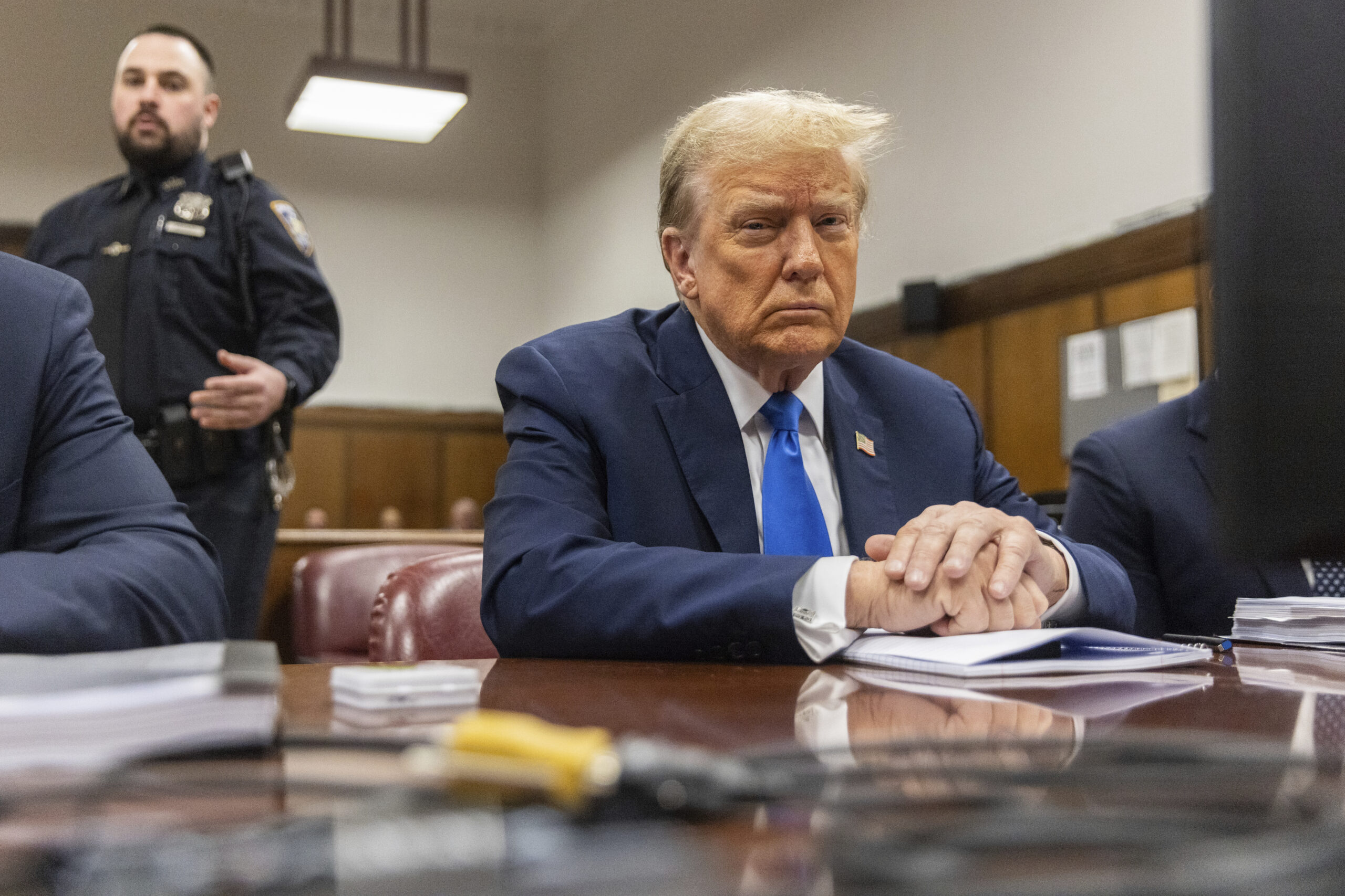 NextImg:Trump trial: Former president told to stop using phone in court - Washington Examiner