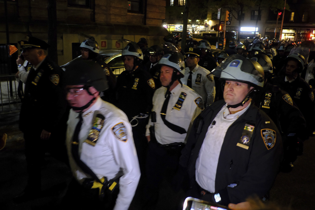 NYPD riot police storm barricaded Columbia building to dislodge protesters