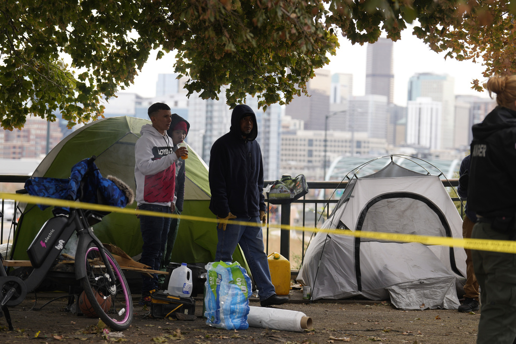 Denver’s mayor reduces funding for the homeless
