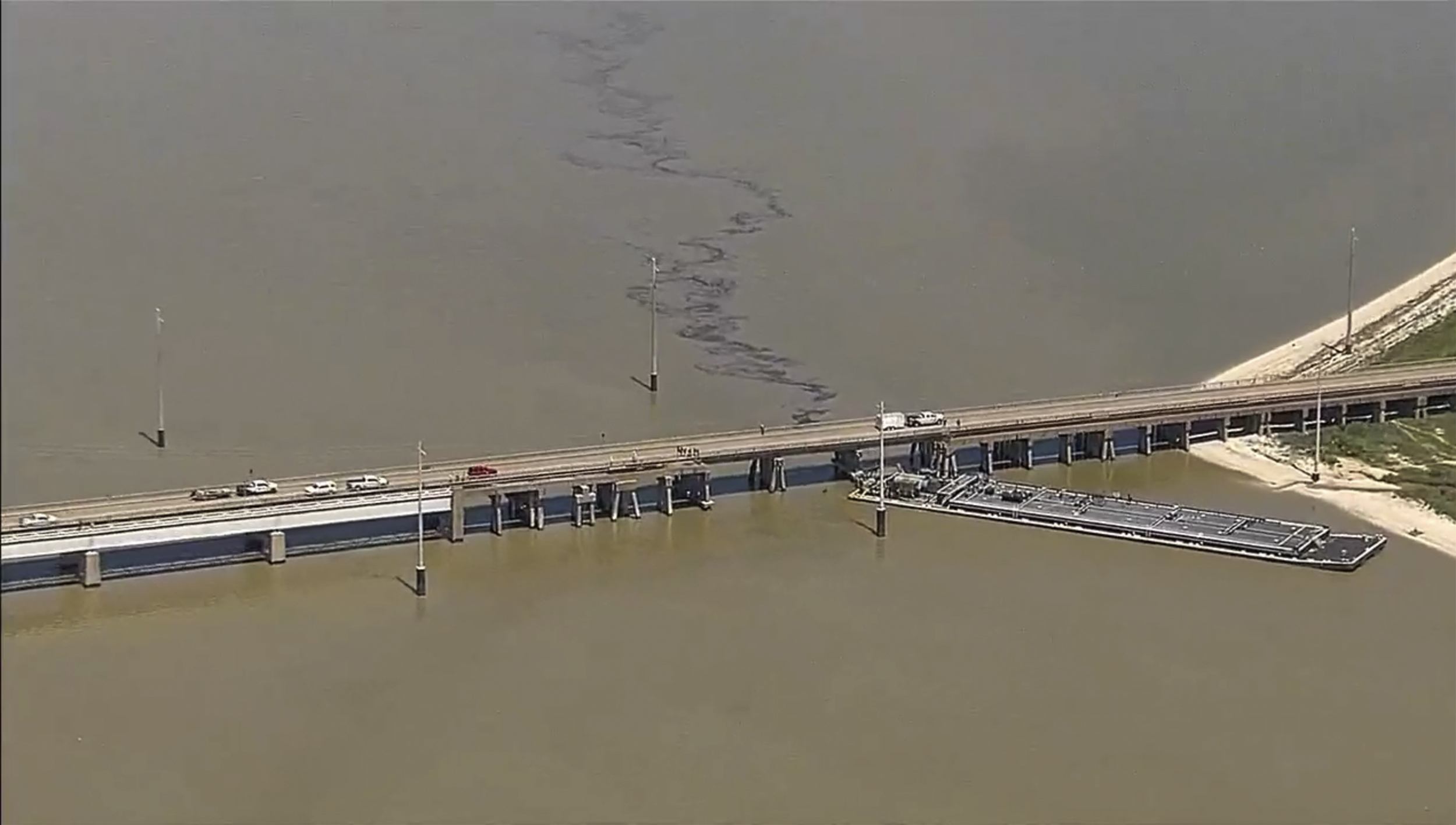 NextImg:Texas bridge partially collapses after barge rams into it and causes oil spill - Washington Examiner