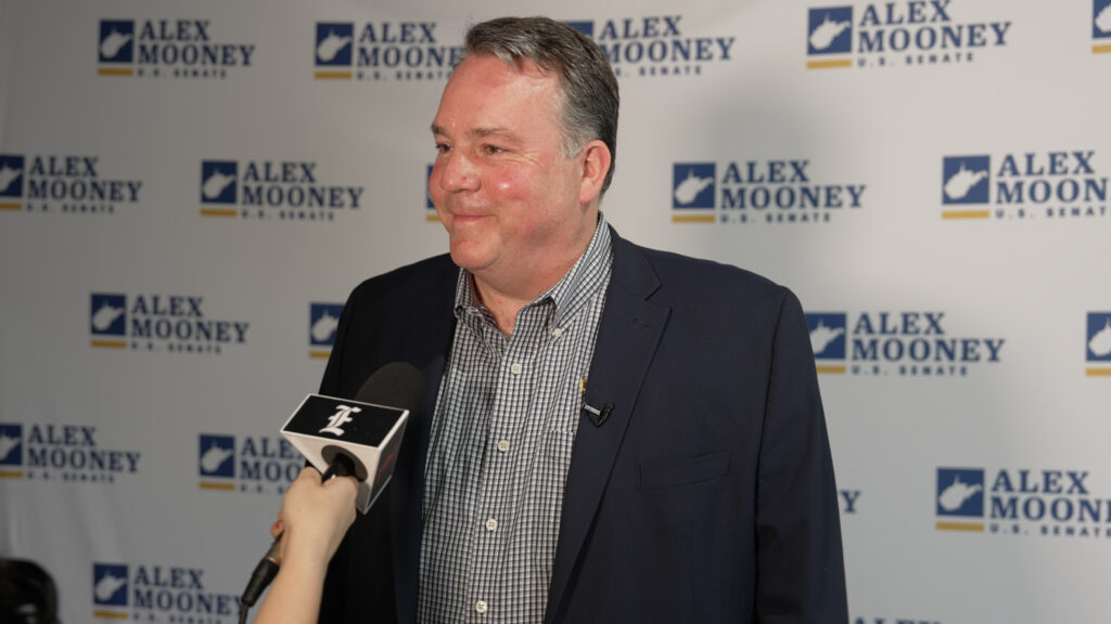 Alex Mooney smiles during interview with Washington Examiner